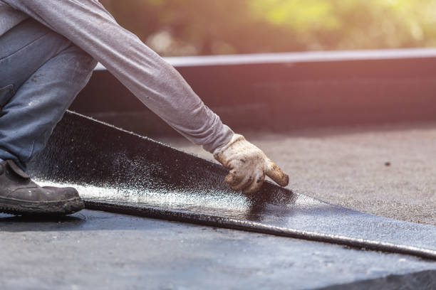 Professional Waterproofing technician working in Newport, KY